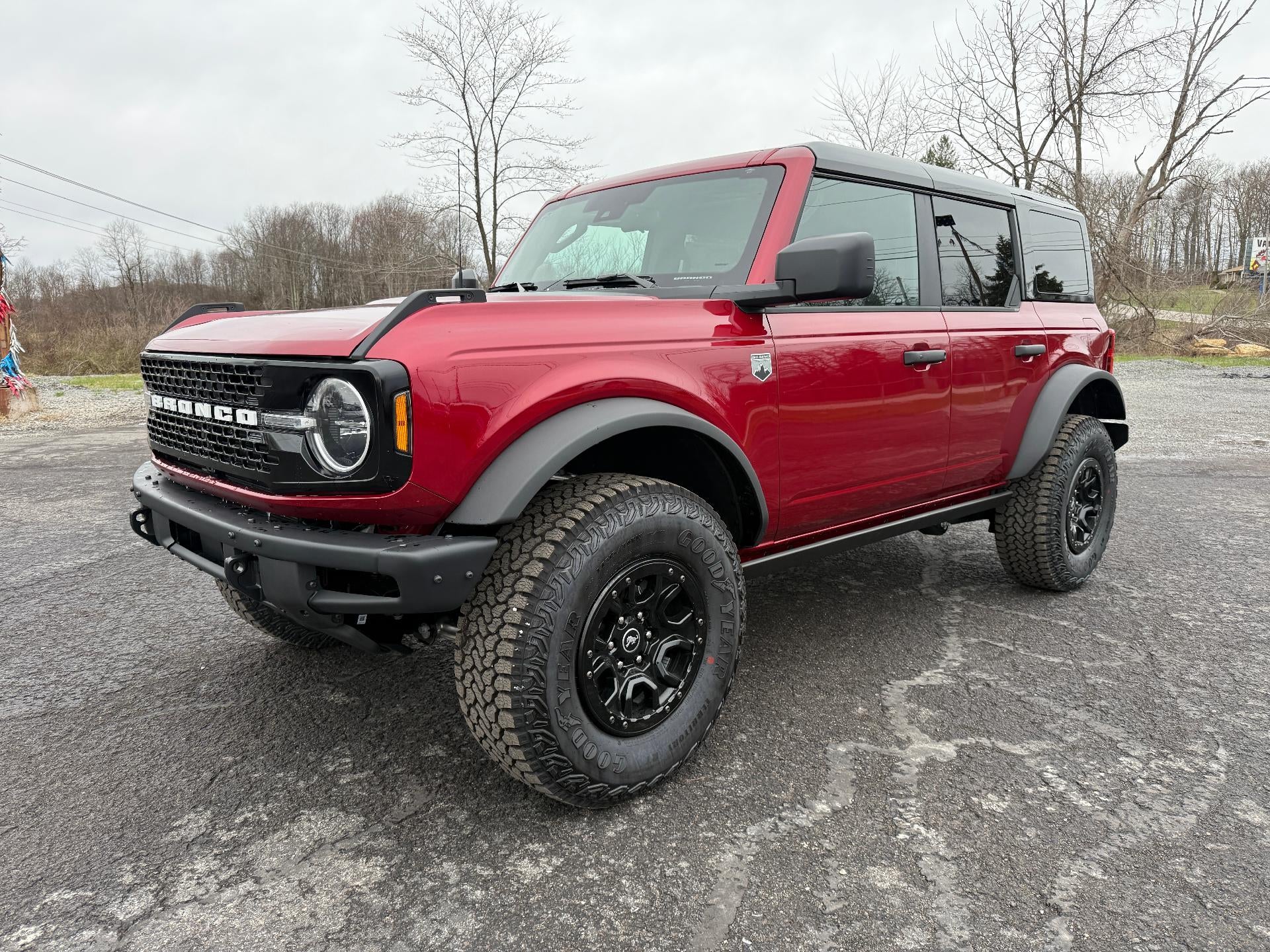 2026 Ford Bronco Big Bend 4 Door 4x4 in Ruby Red Metallic Tinted Clearcoat — front three-quarter view