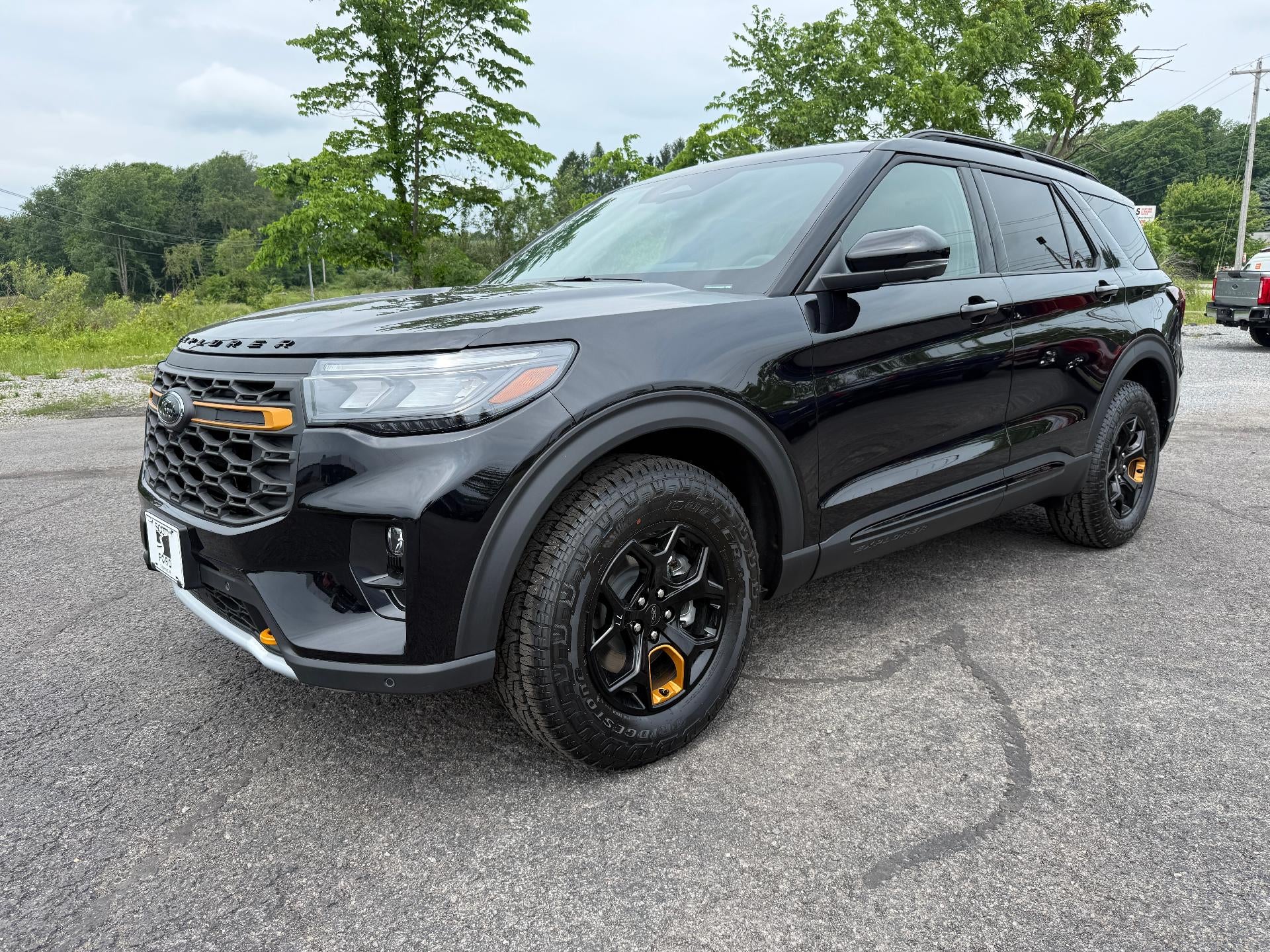 2026 Ford Explorer Tremor 4WD in Agate Black Metallic — front three-quarter view